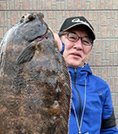 鶴賀谷 定美 氏